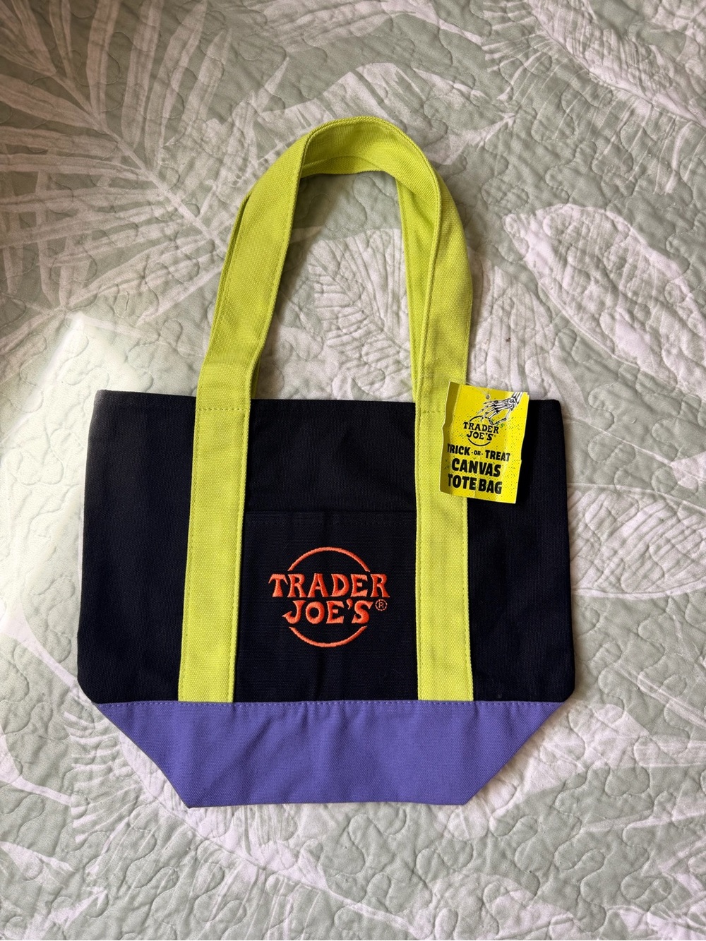 Trader Joe's Black Canvas Tote with Yellow Handles and Purple Base